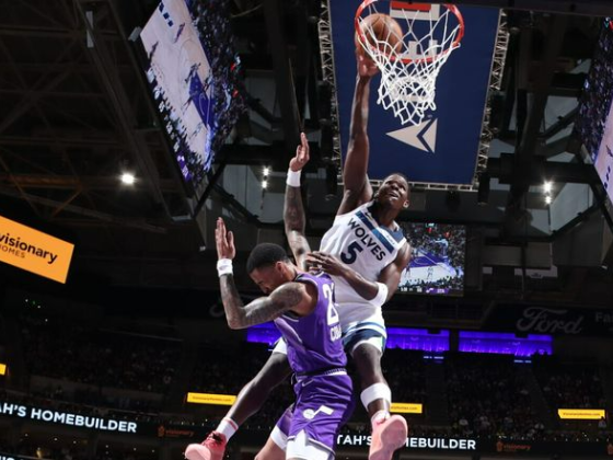 Anthony Edwards throws down viral dunk over John Collins in Wolves' win